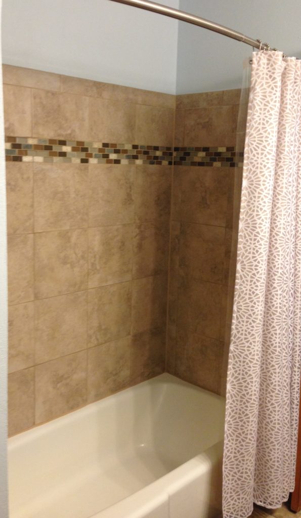 After Picture of a Clean Tub in Bathroom