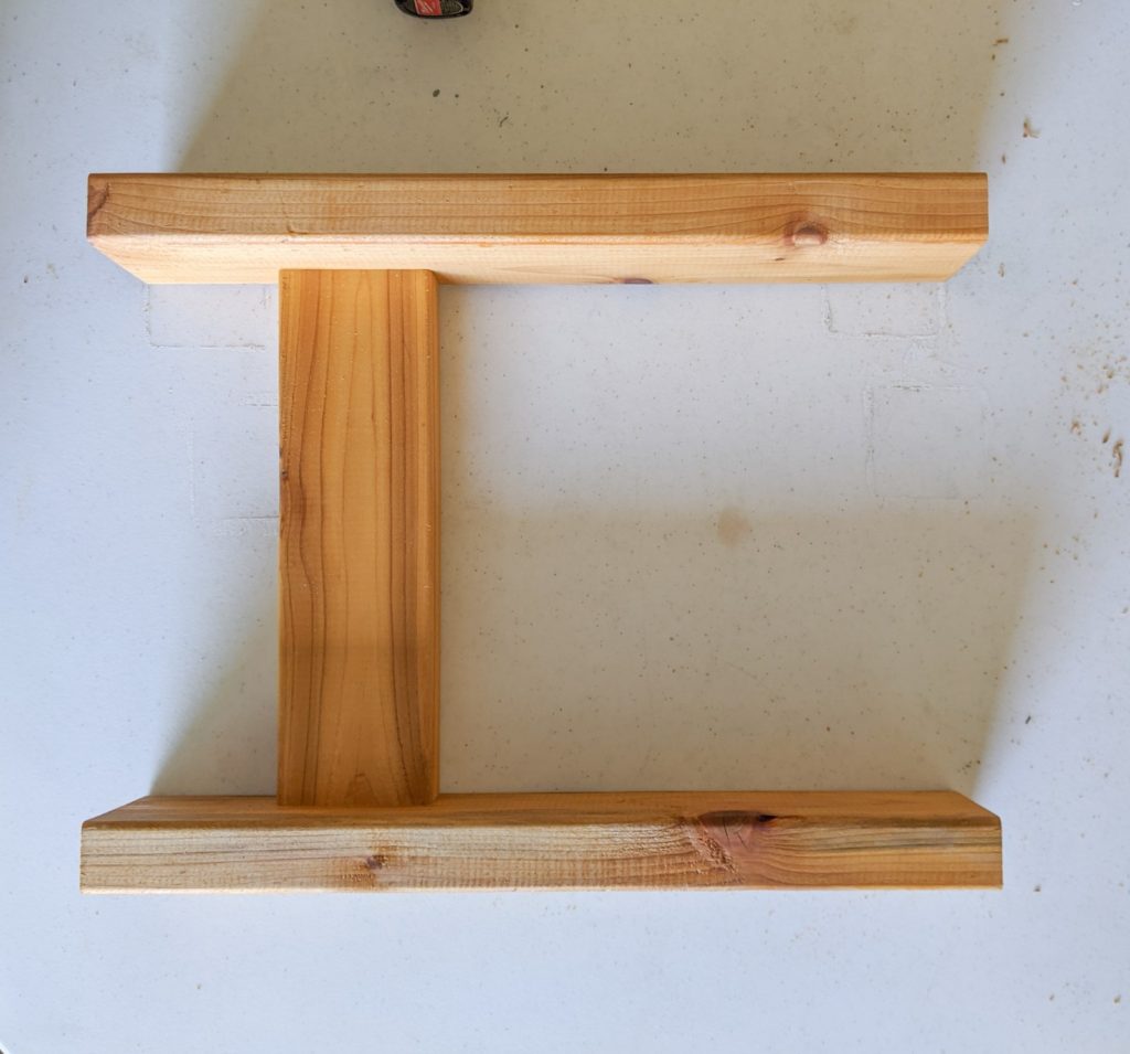 Assembled legs and brace for bench