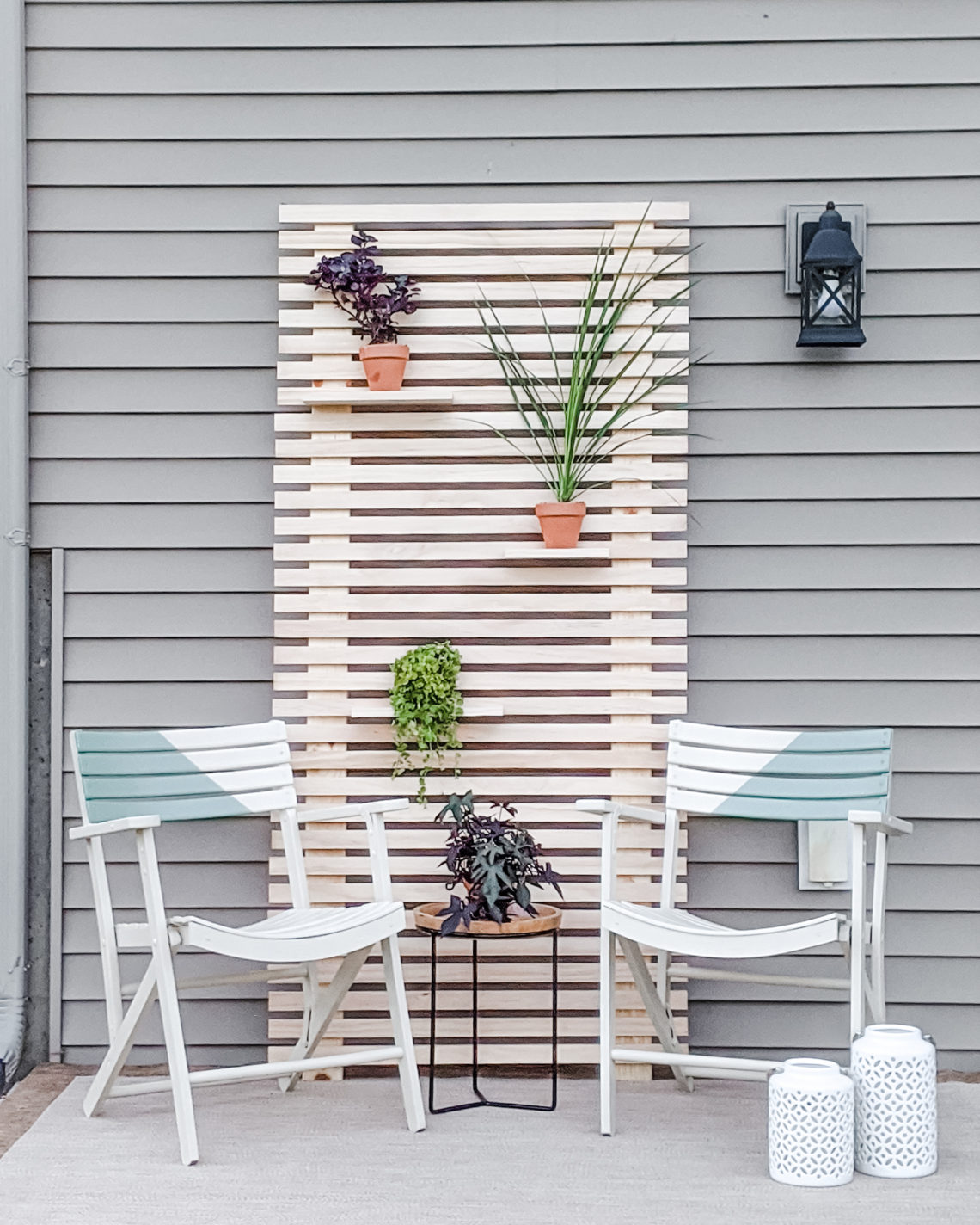 Outdoor Patio Makeover with Painted Chairs and Wood Slat Plant Wall