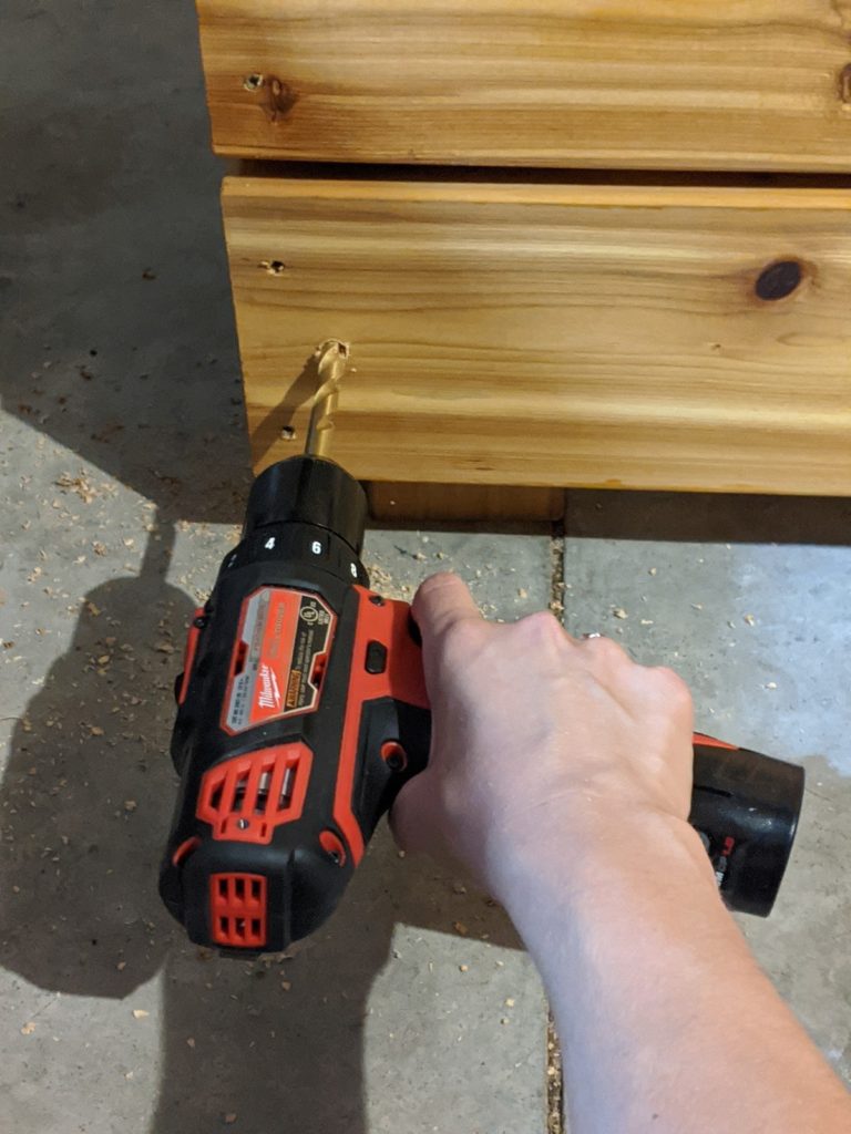 Predrilling holes for the lag screws for the decorative hardware