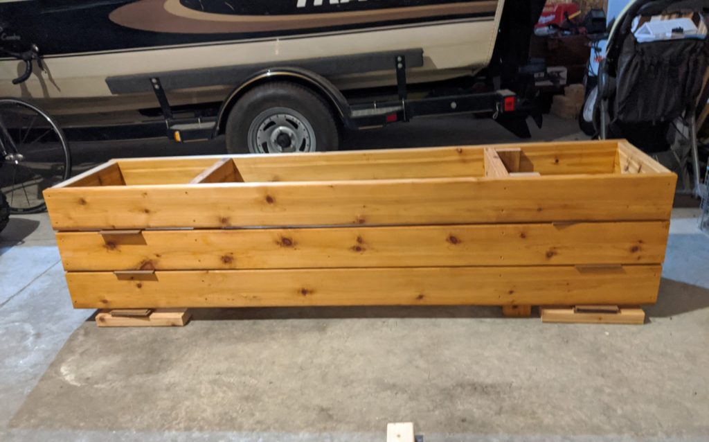 Using spacers between rectangular frames to allow or wood expansion