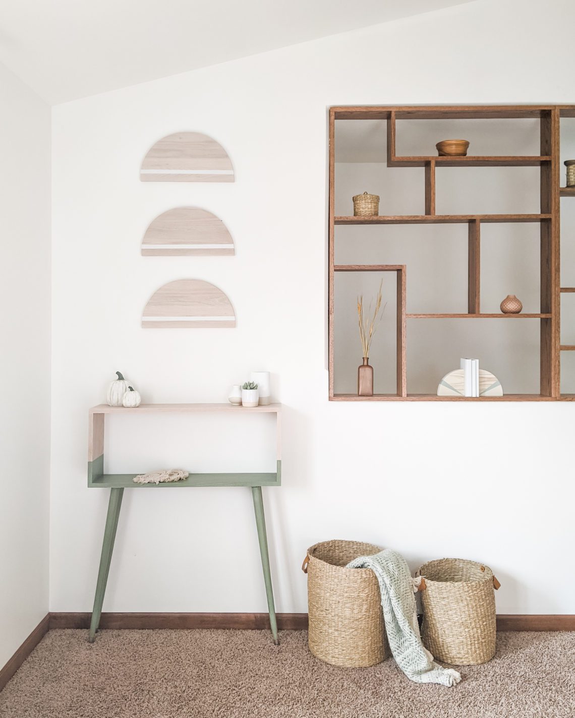 Modern Console Table and Wall Decor in Family Room