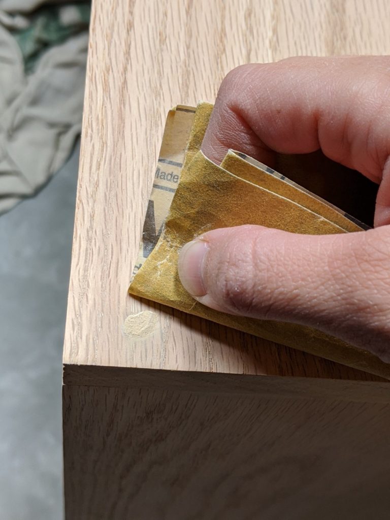 Sanding down dry wood filler