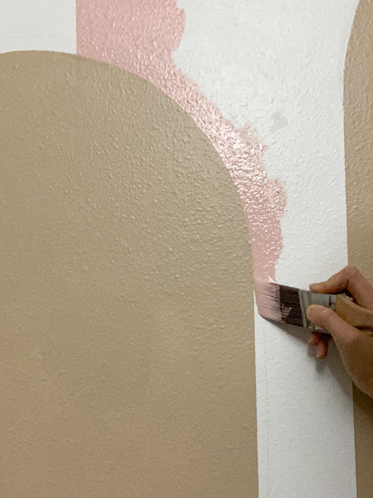 Painting clean lines in color blocking using a Purdy Clearcut Elite paint brush
