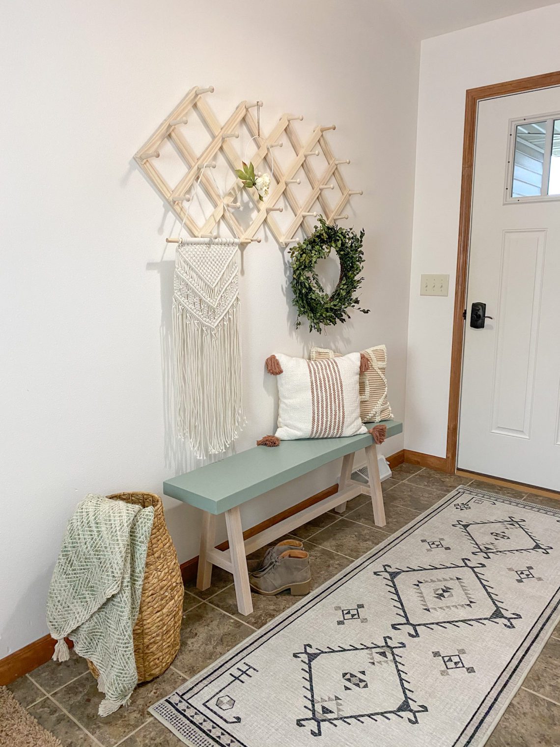 Coastal entryway with bench with Minwax Color of the Year Vintage Blue on it