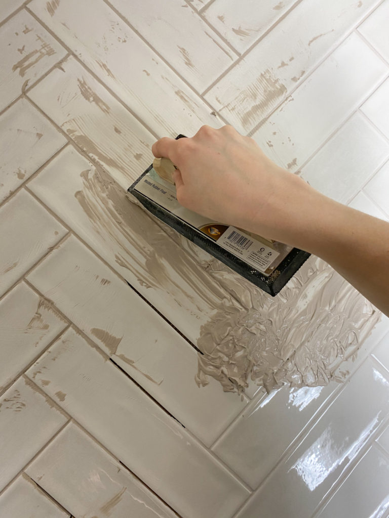 Applying grout to tiles