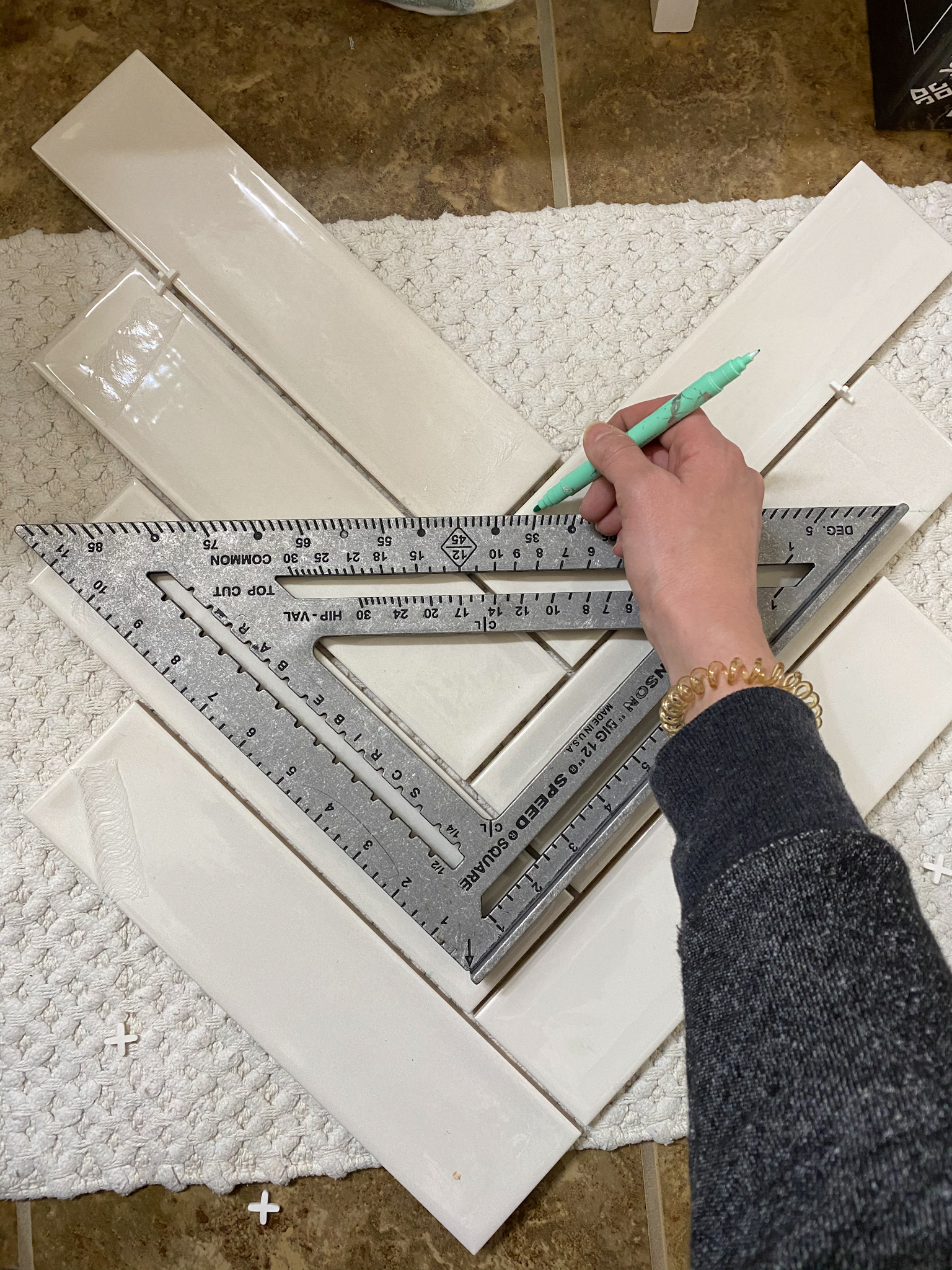 Tiling a Bathroom Wall in a Perfect Herringbone Pattern - The Handcrafted Haven