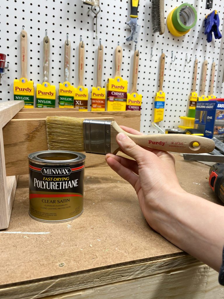 Applying Minwax Polyurethane to final shelves