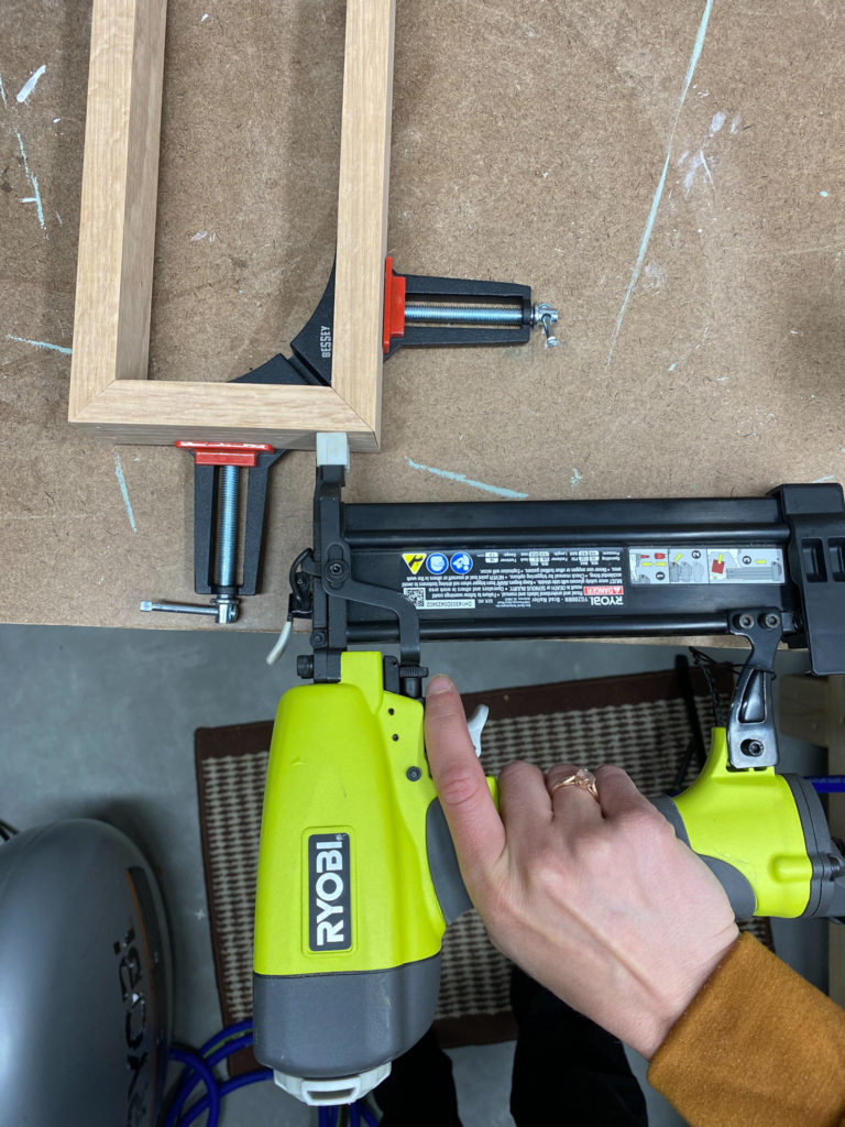 Assembling frames using corner clamps and nail gun