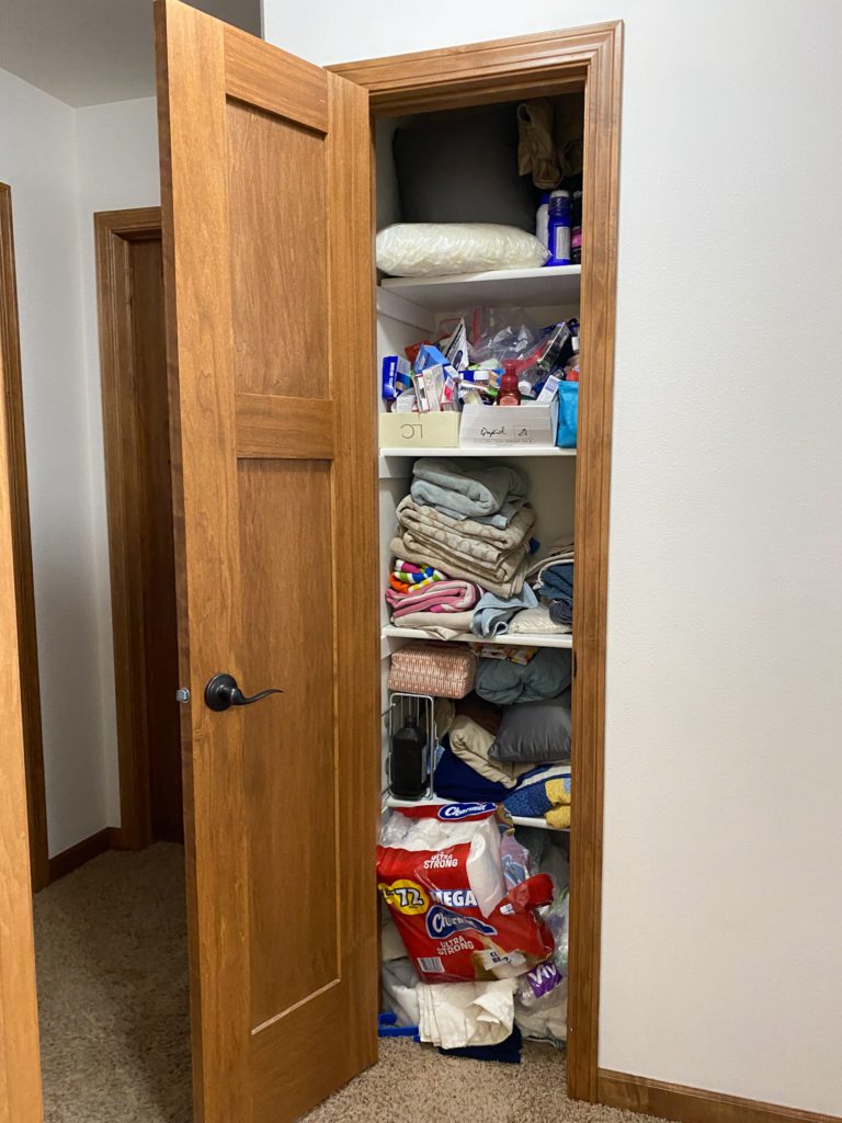 Linen Closet Organization: The Before of the Closet