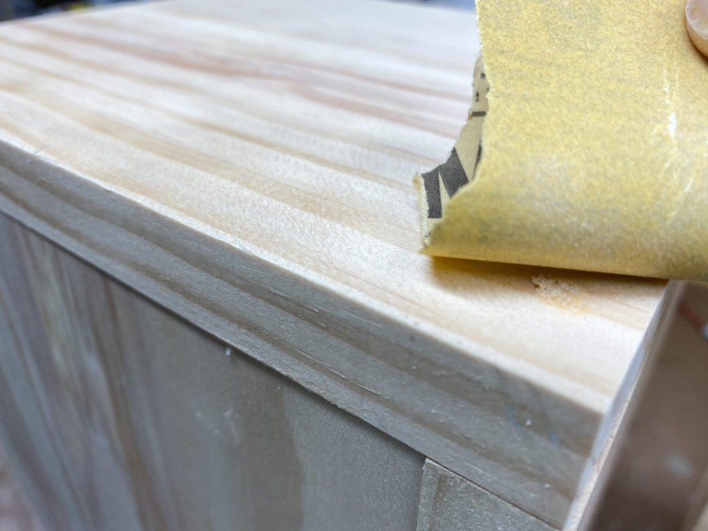 Sanding down wood filler before staining wood boxes