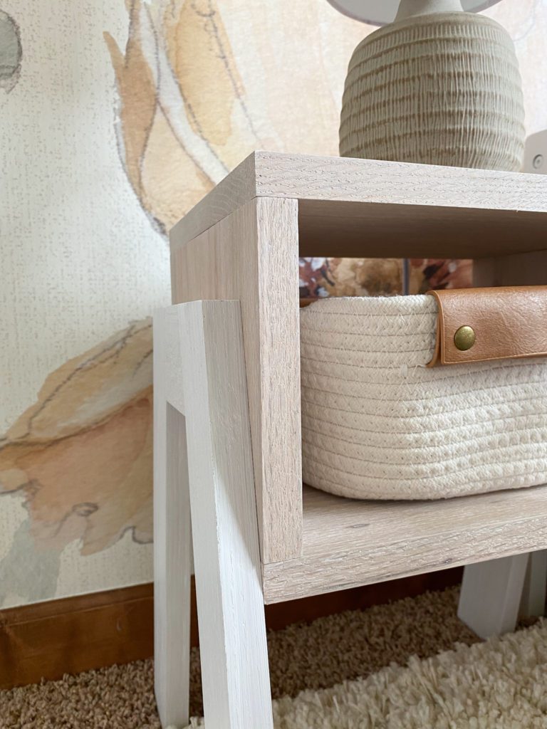 up close view of stained nightstand in girl bedroom