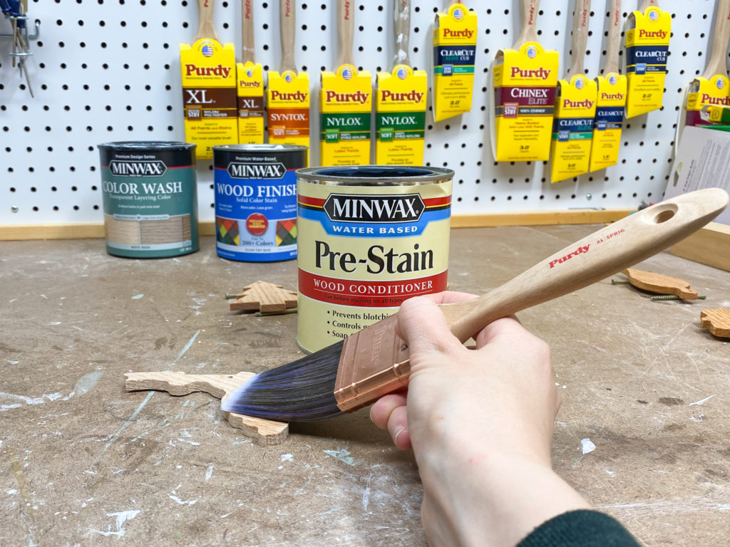 Applying water-based pre-stain wood conditioner