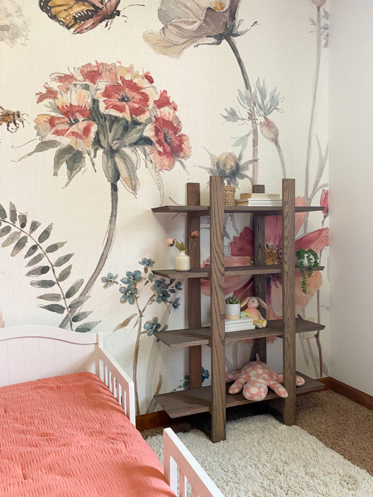 The finished bookshelf in my daughter's flowery room